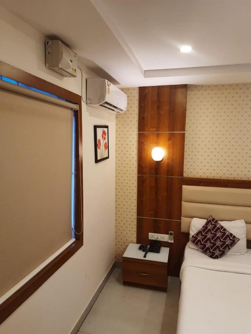 Address 24 Inn Bangalore Extérieur photo